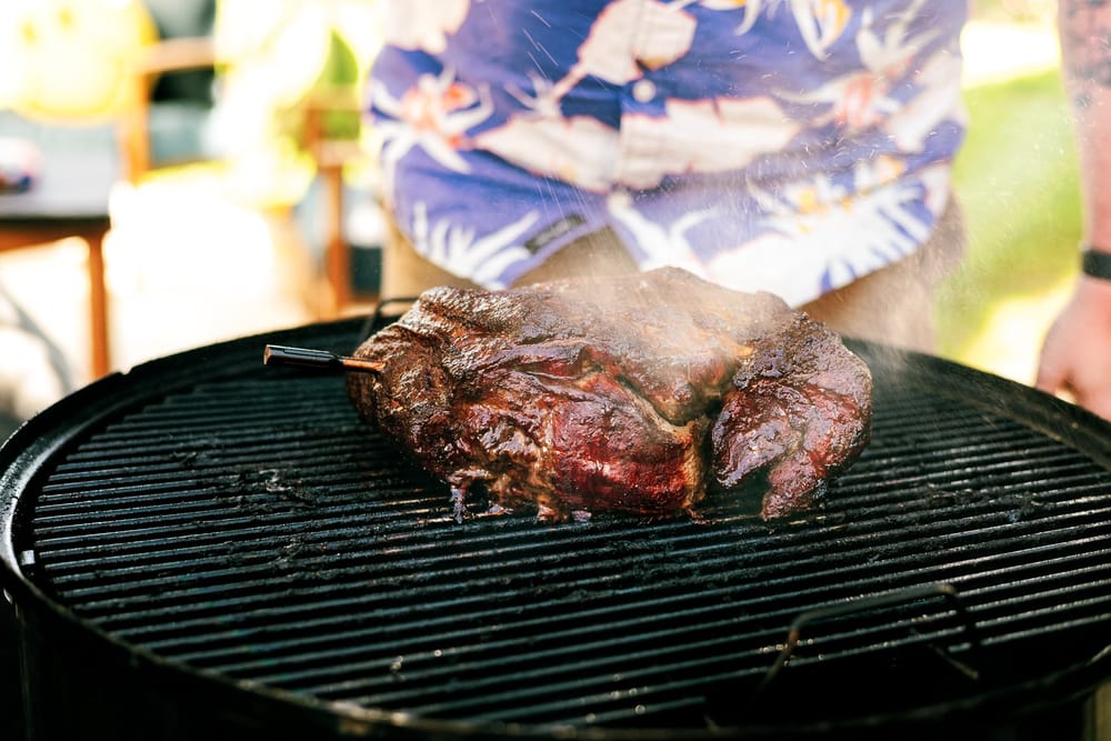 Pulled pork on charcoal grill top