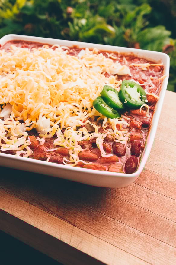 Spicy Crock Pot Chili with Ground beef beans, fresh peppers and a spicy seasoning, This slow cooker chili is a great weeknight dinner!