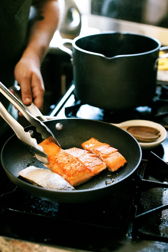 Make this Creamy Garlic Tuscan Salmon recipe in just 30 minutes! A one-pan meal with a rich parmesan sauce, sun-dried tomatoes & spinach.