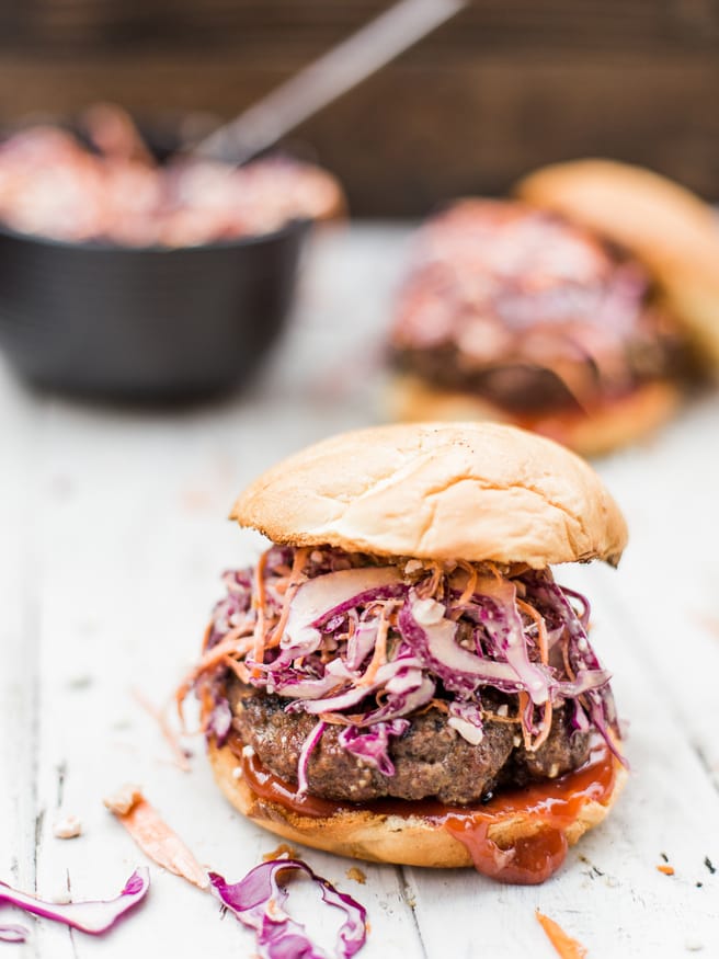Bacon Bleu Cheese Cole Slaw Burger - A red cabage coleslaw topped on a half pound juicy burger. Amazing way to change up your burger night! dadwithapan.com
