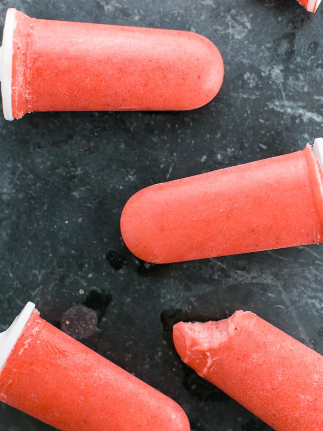 Popsicles with banana ice cream, strawberries, and coconut almond milk. Guiltless and perfect for a hot summer day! 