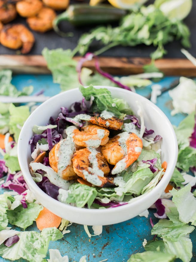 Grilled Margarita shrimp on a Southwestern Crunch Salad mix from Taylor Farms. Topped with a Jalapeno Cilantro Ranch dressing makes a perfect summer dinner!