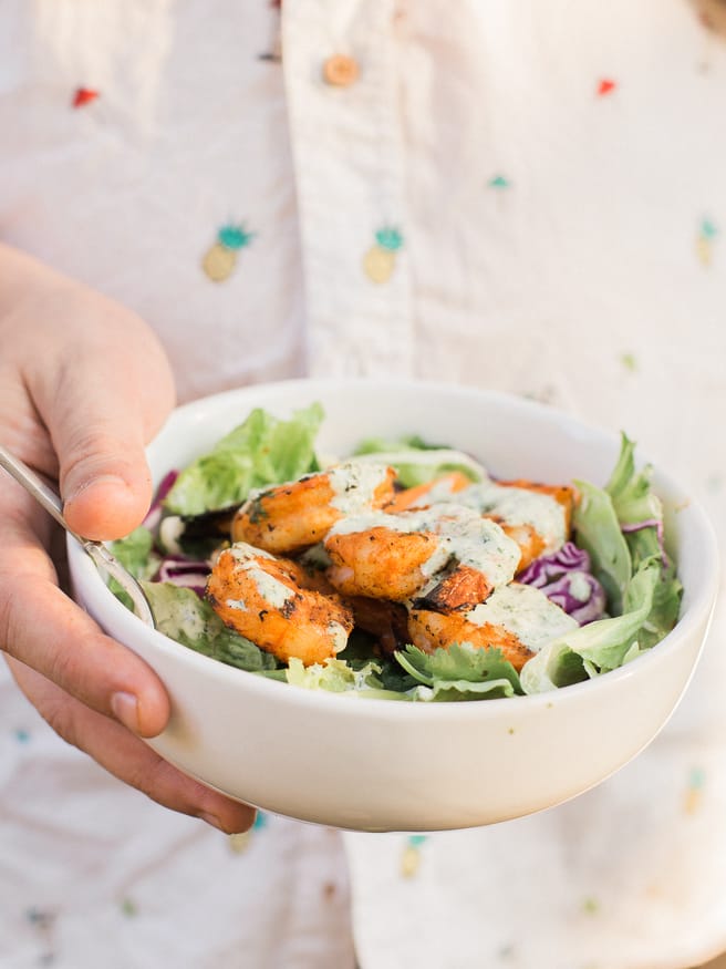Grilled Margarita shrimp on a Southwestern Crunch Salad mix from Taylor Farms. Topped with a Jalapeno Cilantro Ranch dressing makes a perfect summer dinner!