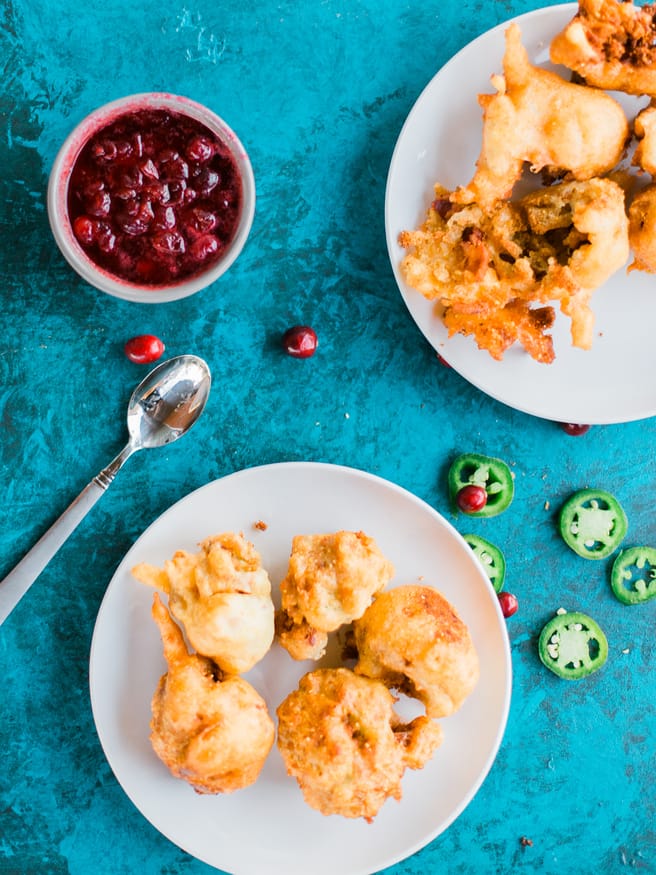 Fried Bacon and Thanksgiving Stuffing Fritters served with a sweet and spicy jalapeno cranberry sauce. Sure to be the hit at your thanksgiving get together!