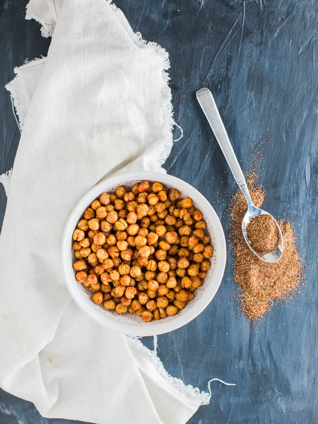 Roasted chickpeas with a from scratch chili seasoning. These roasted chickpeas taste amazing and are great to snack on when lounging around the house!