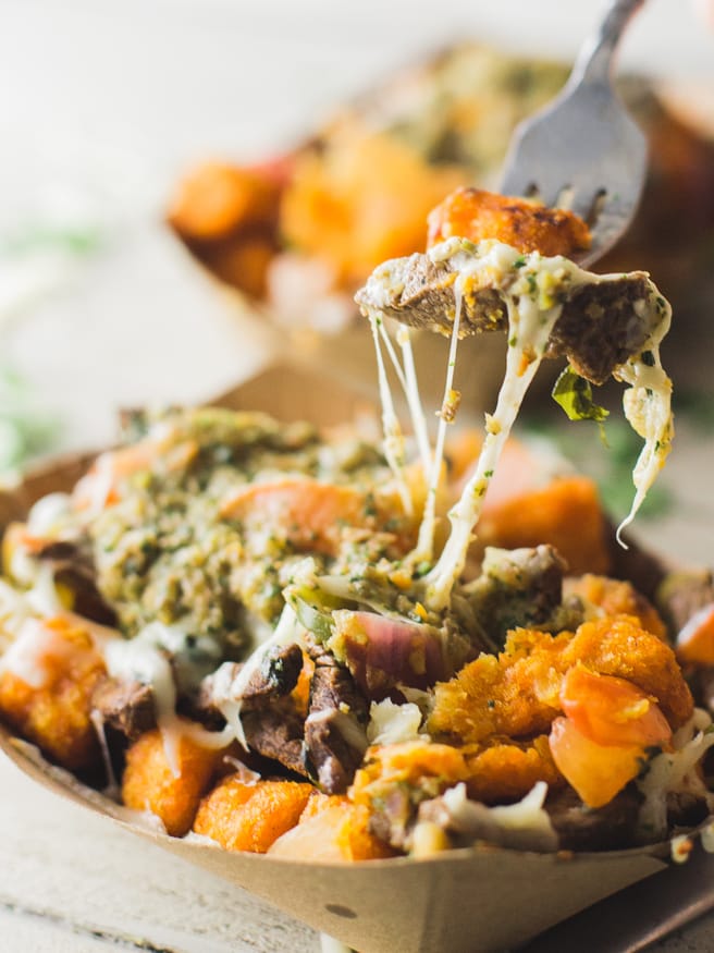 These totchos are loaded with steak mozzarella cheese, and veggies topped with a chimichurri style salsa is a new favorite that I'll be eating A LOT!
