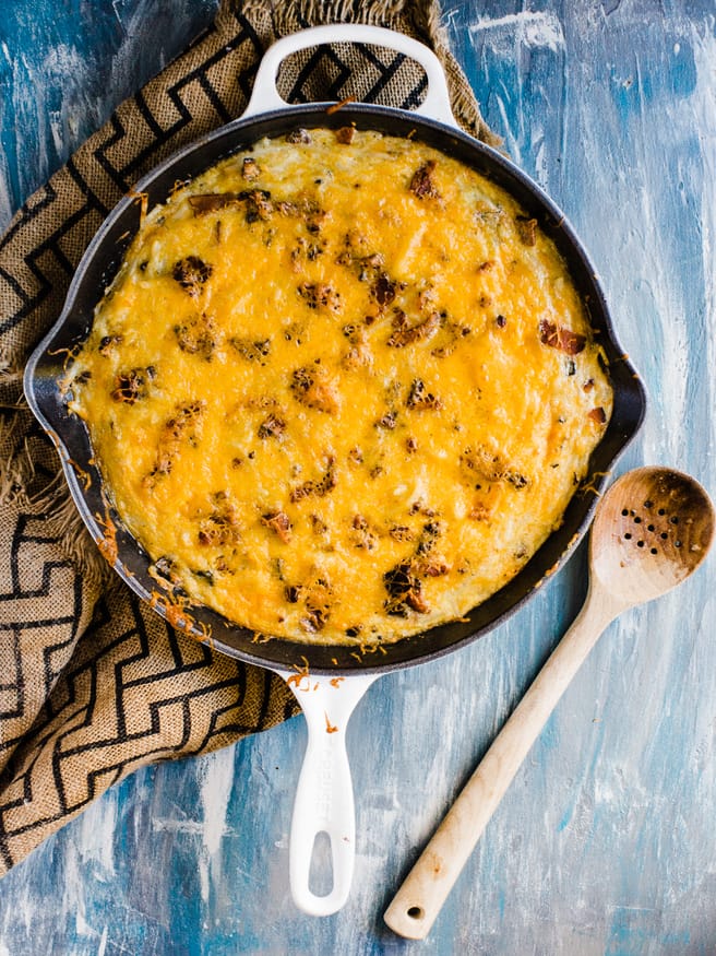 This breakfast skillet is loaded with cheese, bacon, and egg and hash browns. The ultimate casserole to bring to brunch!