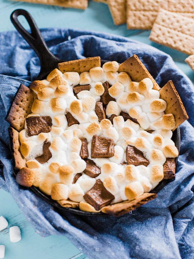 A Grilled S'more Dip is an easy treat for movie night, or outdoor party is definitely a great way to let get in on the S'more action!