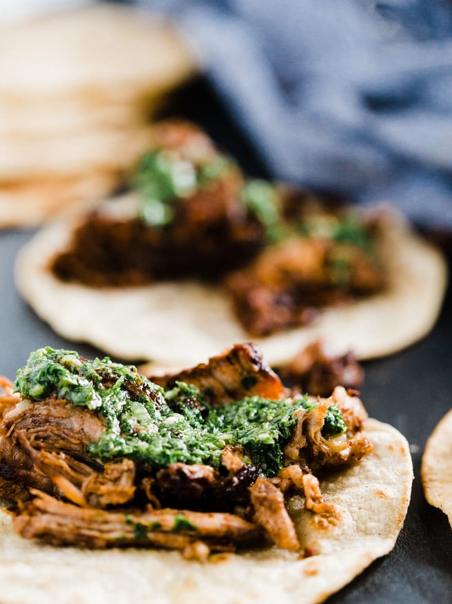 Grilled barbacoa tacos, cooked low and slow with a zesty chimichurri sauce. Barbacoa makes an excellent change to taco Tuesday! 