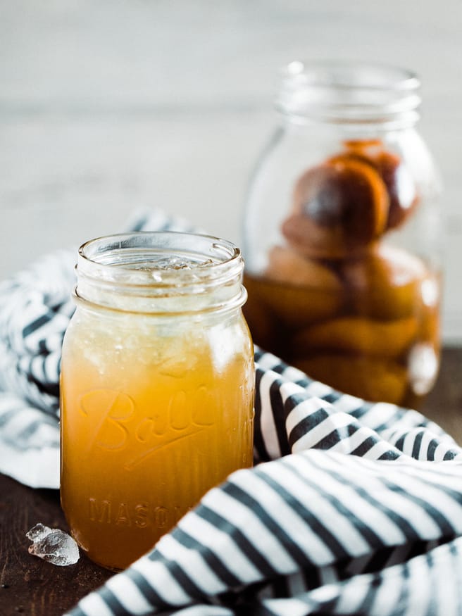 A homemade apricot whiskey, soaking fresh apricots in whiskey. When it was finally ready, I mad an amazing Apricot Whiskey Iced Tea Cocktail!