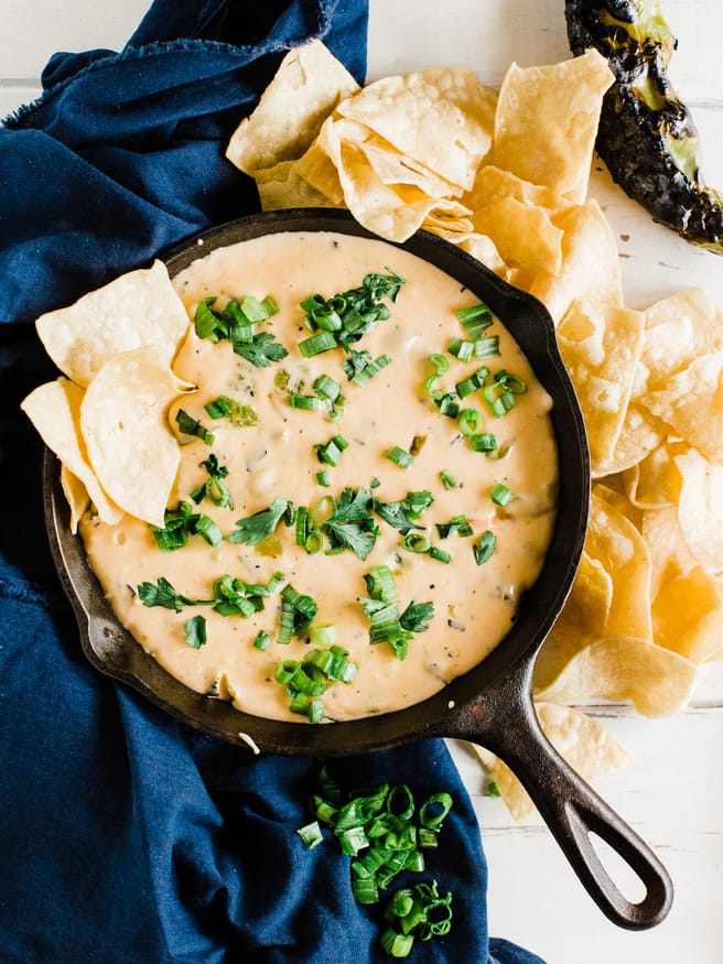 A roasted hatch pepper queso dip loaded with various cheese's and perfect for game day!. Hatch peppers we're meant for queso dip! 