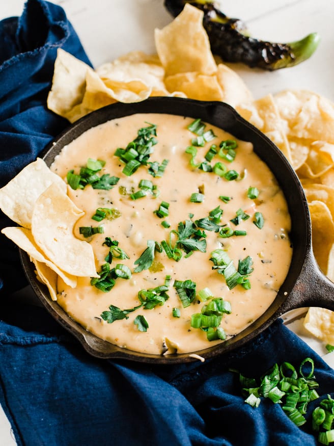 A roasted hatch pepper queso dip loaded with various cheese's and perfect for game day!. Hatch peppers we're meant for queso dip! 