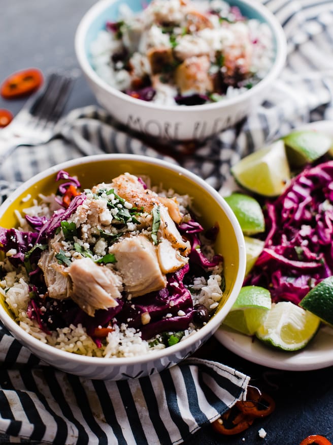 Fish Burrito Bowl with a spicy Cilantro Lime red cabbage slaw. Fresh and filling and makes a perfect weeknight meal! 