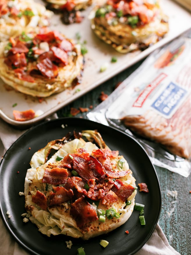 Roasted Cabbage Steaks topped with bacon and bleu-cheese make a great high protein low carb mean that has tons of flavor and easy to prep!