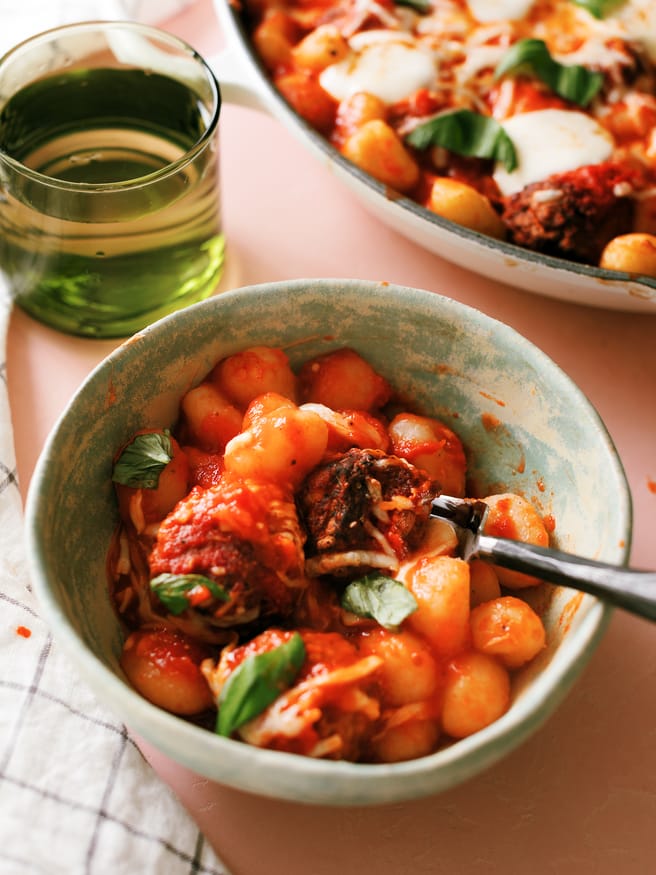 Gnocchi, meatballs and cheese loaded in a skillet and baked to perfection. Such a simple and delicious weeknight dinner for the family!