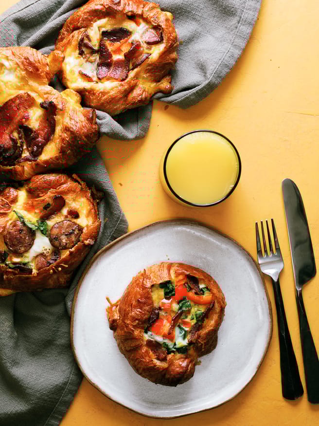Breakfast Croissant Boats loaded with an egg bacon and bell pepper frittata is soo delicious and the perfect way to get your weekend breakfast going!