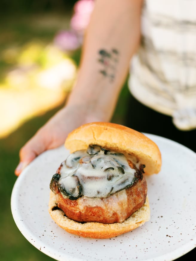 Bacon Wrapped Soda Can Burgers filled with Mac an Cheese for the kids, and grilled onion and mushroom with swiss for the adults!