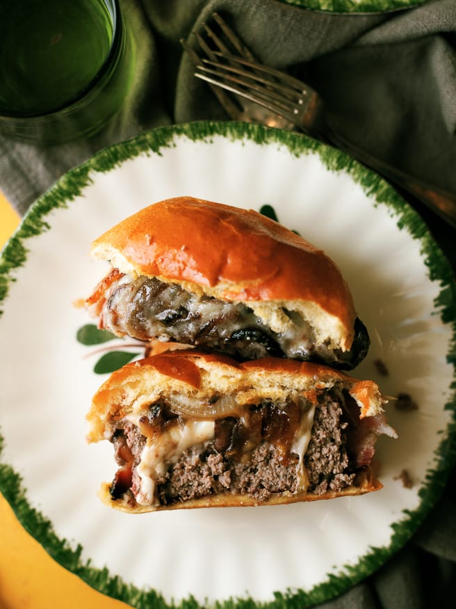Bacon Wrapped Soda Can Burgers filled with Mac an Cheese for the kids, and grilled onion and mushroom with swiss for the adults!