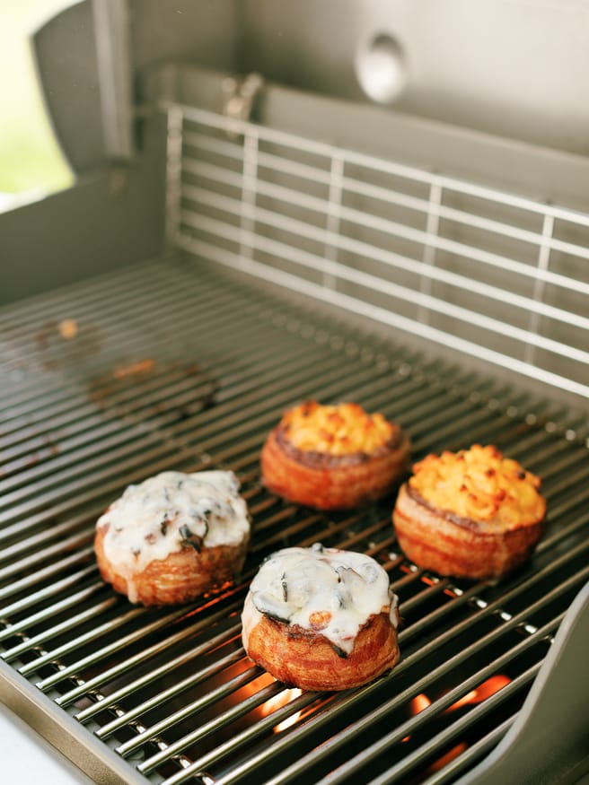 Bacon Wrapped Soda Can Burgers filled with Mac an Cheese for the kids, and grilled onion and mushroom with swiss for the adults!