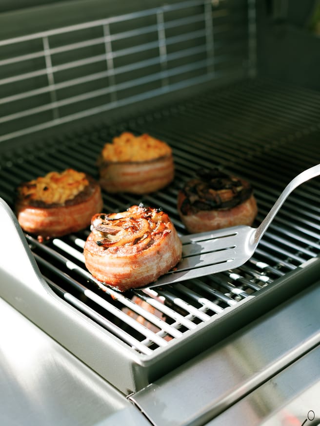 Bacon Wrapped Soda Can Burgers filled with Mac an Cheese for the kids, and grilled onion and mushroom with swiss for the adults!