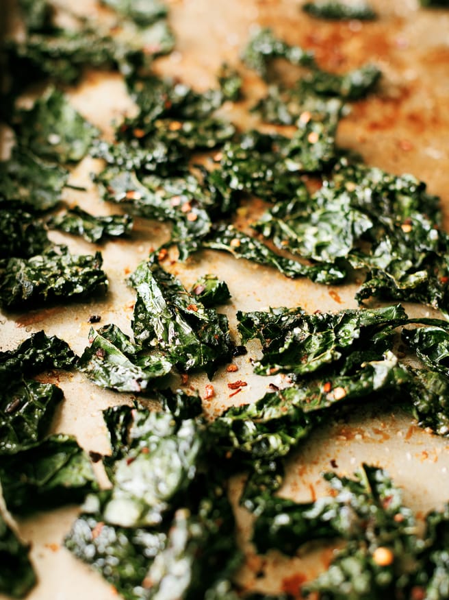 Kale Chips are so easy to make, and a great snack to munch on without the guilt. Easily one of my new favorite snacks on the go!