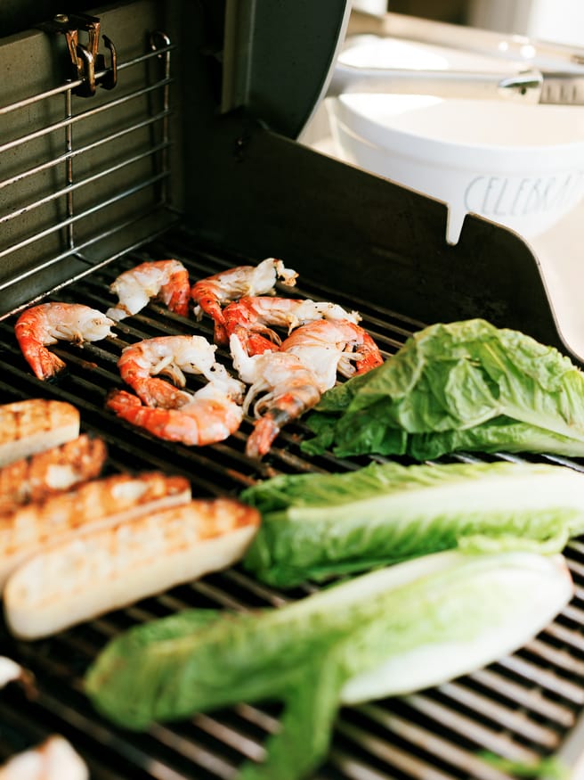 Grilled shrimp, grilled romaine lettuce, and grilled ciabatta bread. for a Caesar salad