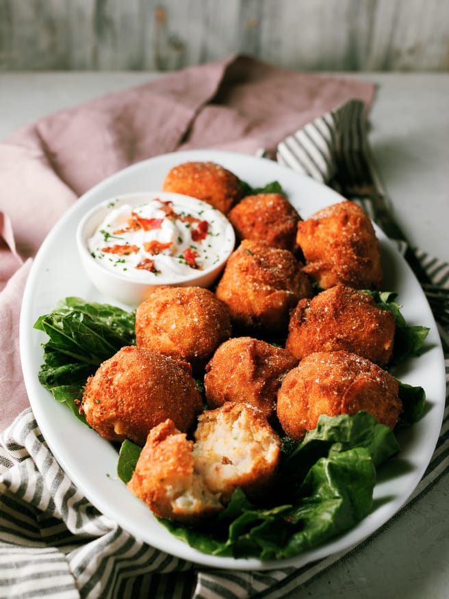 Fried Mashed Potato balls are loaded with cheese, bacon and a little garlic and herb seasoning. It’s the perfect thanksgiving app!