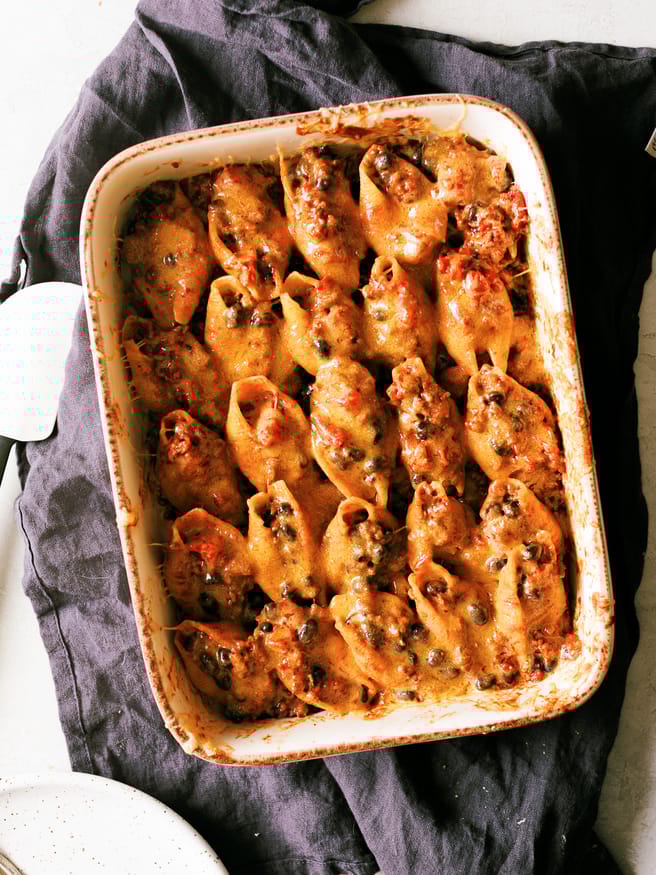 These taco stuffed shells with ground beef taco filling are worth having on the dinner table when you want to change up taco night or pasta night.
