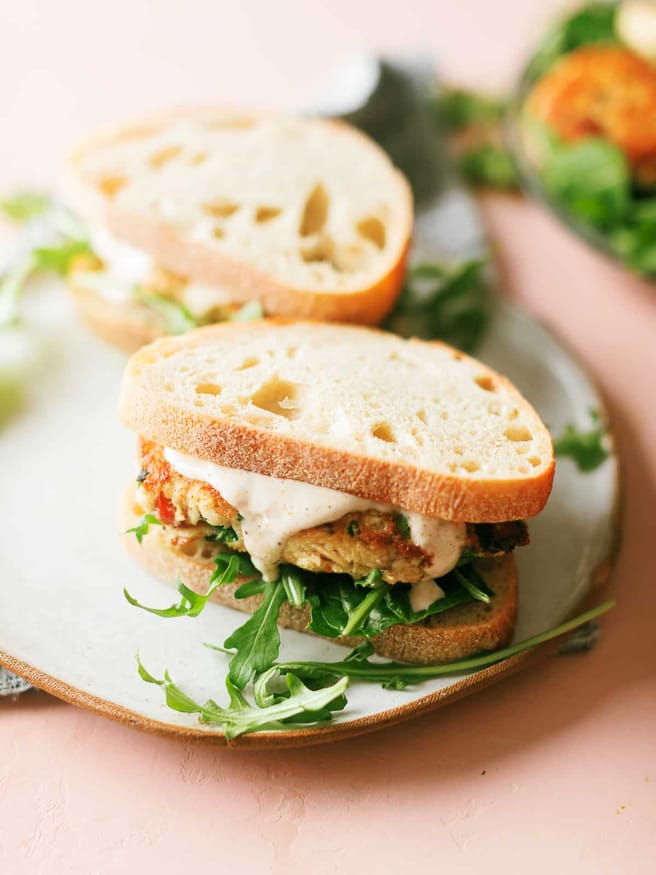Tuna Fish Cake Sandwich packed with green onion, water chestnuts, jalapeno and topped off with an Old Bay Aioli that is amazing! 