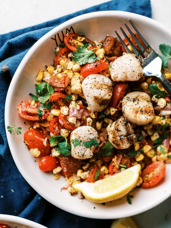 Bacon corn tomato salad with grilled scallops is a light and easy recipe to make for lunch or dinner. Its zesty, fresh, and full of flavor! 