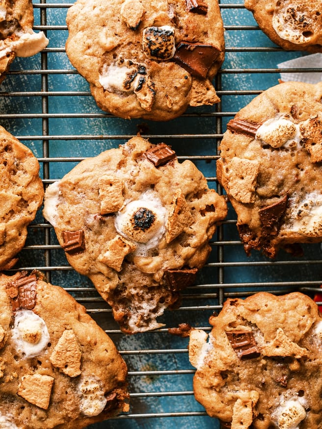 These smoked s'mores cookies are next level. They're s'mores combined with a chocolate chip cookie on a pellet grill to get a beautiful smokey flavor! 