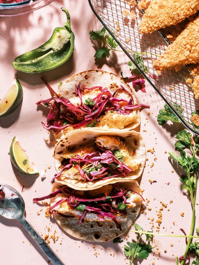 These tortilla chip crusted tilapia fish tacos with a jalapeno lime red cabbage slaw is exactly what you need in your life. 