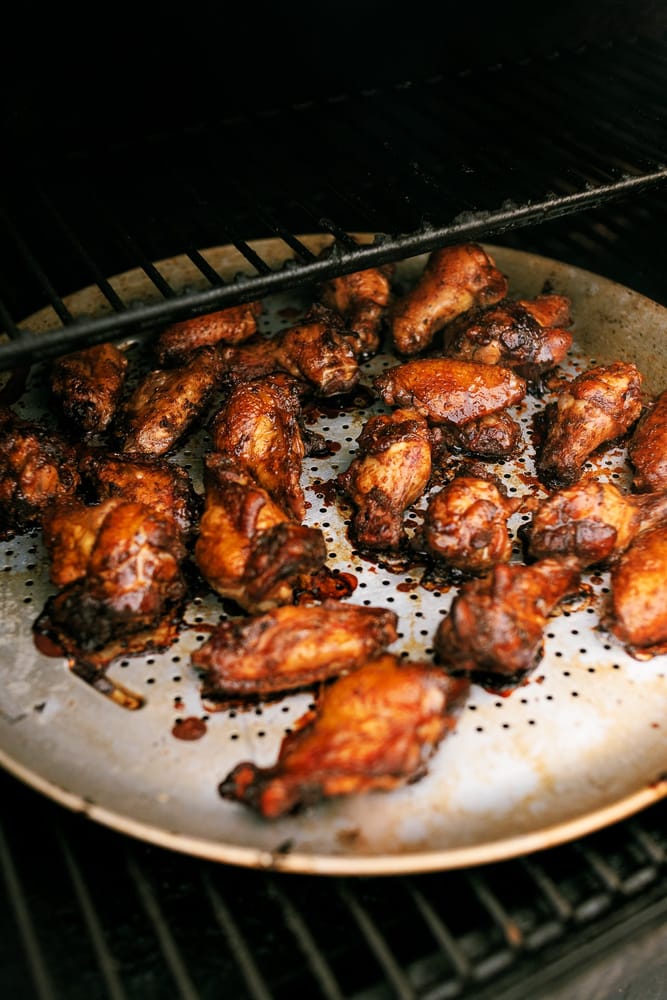 Smoked Peruvian Chicken Wings drizzled with a Aji Verde style spicy green sauce. Umami flavors, paired with a bright zesty and spicy flavors!