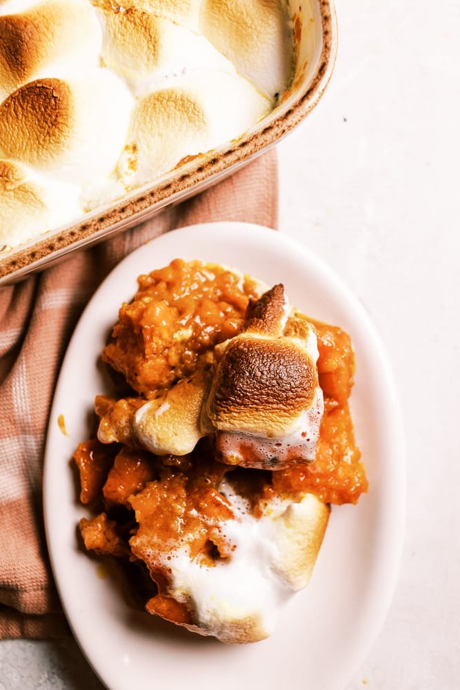 Southern Candied Yams Recipe, where Sweet potatoes are transformed into caramelized, marshmallow-topped perfection. 