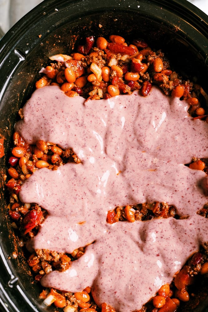 Spicy Slow Cooker chili that can be made in a crockpot or in the oven low and slow. Added heat from serrano and jalapeno peppers and yes - this chili had beans in it!