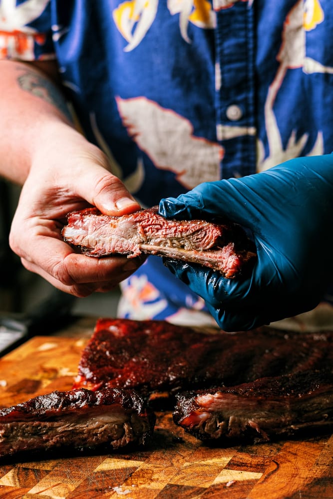How to BBQ perfect tender and juicy St. louis Style Pork Ribs on the smoker every time. This is the best rib recipe you'll ever try!