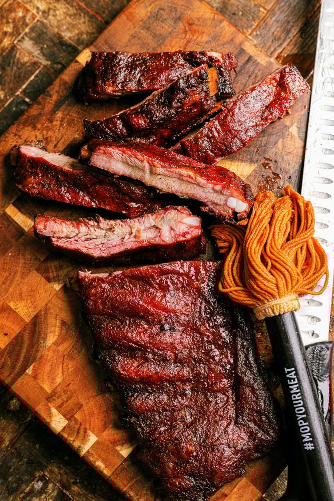 How to BBQ perfect tender and juicy St. louis Style Pork Ribs on the smoker every time. This is the best rib recipe you'll ever try!