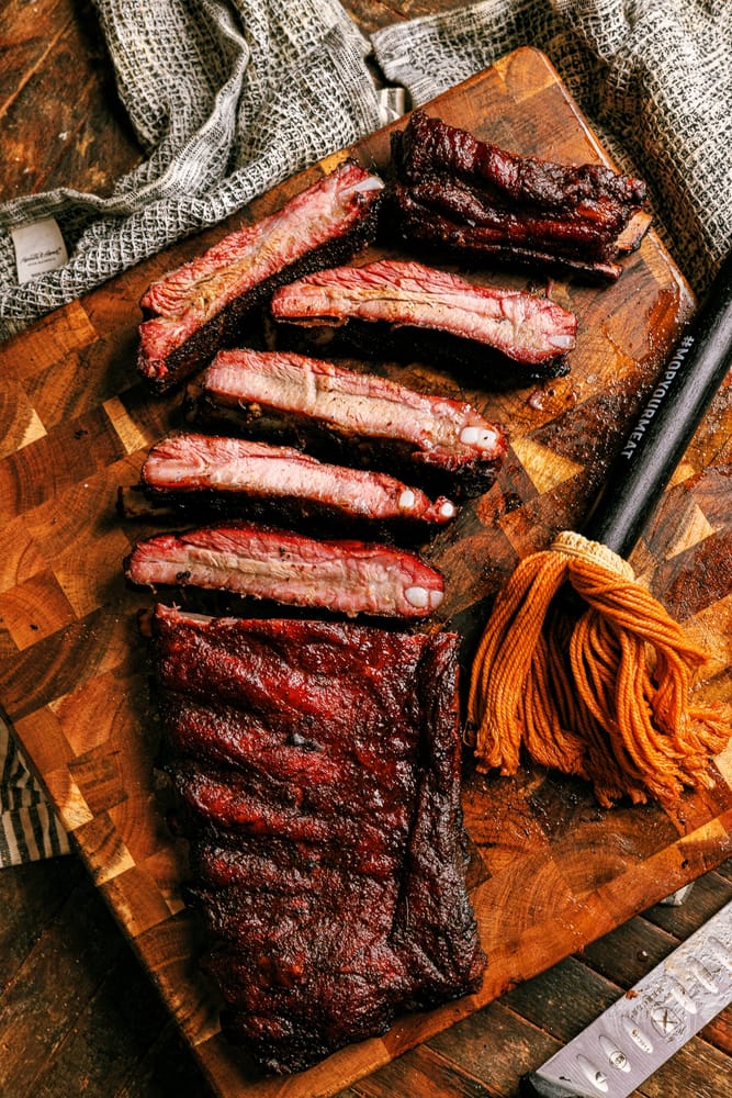How to BBQ perfect tender and juicy St. louis Style Pork Ribs on the smoker every time. This is the best rib recipe you'll ever try!