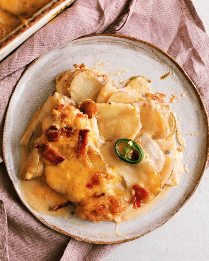 The best scalloped potatoes I've had so far. They are loaded with savory flavor using 3 cheeses, bacon, and cream of mushroom. Plus a little bit of heat with the add of jalapeno!