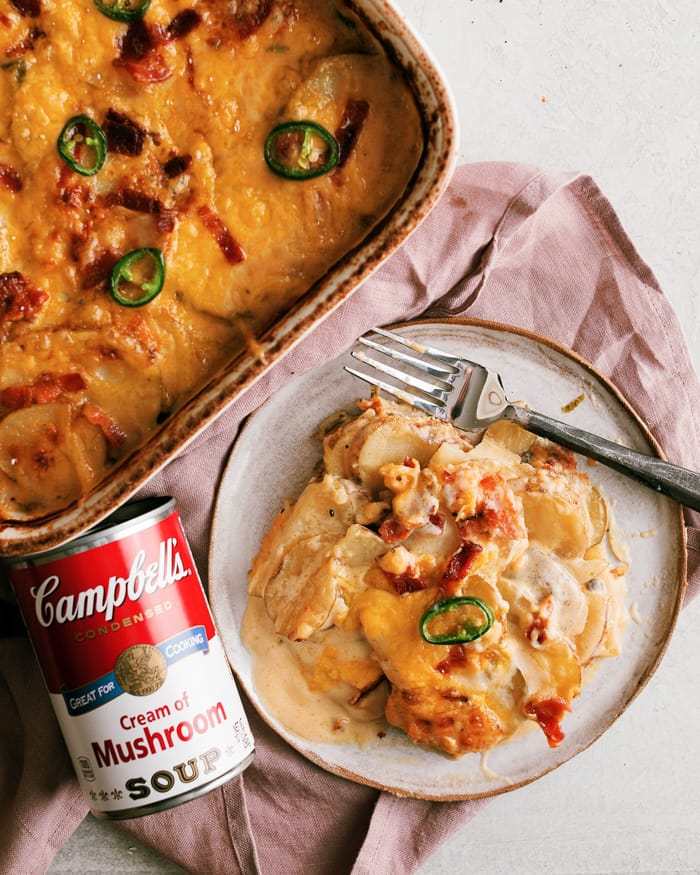 The best scalloped potatoes I've had so far. They are loaded with savory flavor using 3 cheeses, bacon, and cream of mushroom. Plus a little bit of heat with the add of jalapeno!