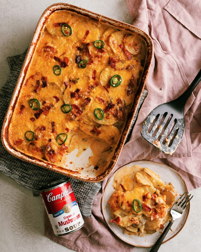 The best scalloped potatoes I've had so far. They are loaded with savory flavor using 3 cheeses, bacon, and cream of mushroom. Plus a little bit of heat with the add of jalapeno! 