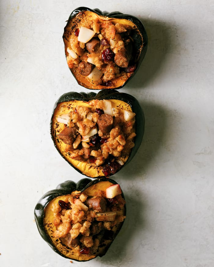 Roasted Acorn Squash with a sweet and savory breakfast  stuffing that is plant-based. Easily interchangeable with meat proteins to make this perfect everyone