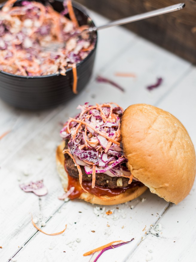 Bacon Bleu Cheese Cole Slaw Burger - A red cabage coleslaw topped on a half pound juicy burger. Amazing way to change up your burger night! dadwithapan.com