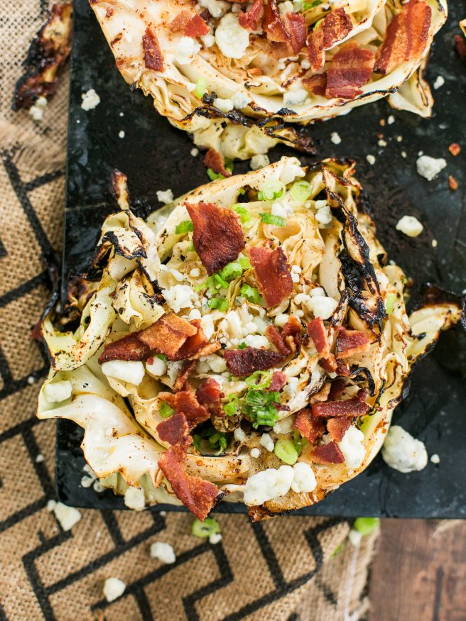 Grilled Cabbage Steaks Marinated With McCormick Grill Mates Smoky Applewood seasoning, topped with Bacon, Blue Cheese, and Green onions!