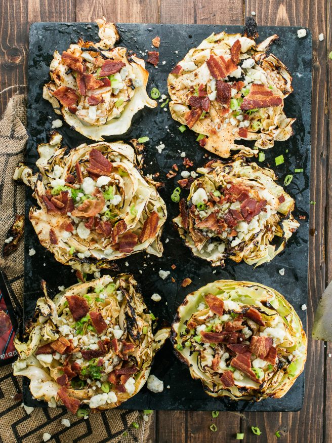 Grilled Cabbage Steaks Marinated With McCormick Grill Mates Smoky Applewood seasoning, topped with Bacon, Blue Cheese, and Green onions!