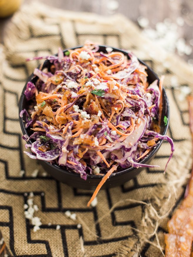 A Red Cabbage Cole Slaw with Bacon, Bleu Cheese, Dijon mustard, and a bit of cilantro makes this a fresh and flavorful cole slaw thats perfect for summer!
