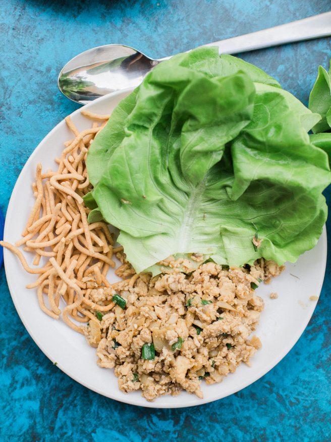 Chicken lettuce wraps cooked in soy sauce, hoisin sauce, sriracha and other amazing ingredients. A great appetizer or main course. One of my favorites!