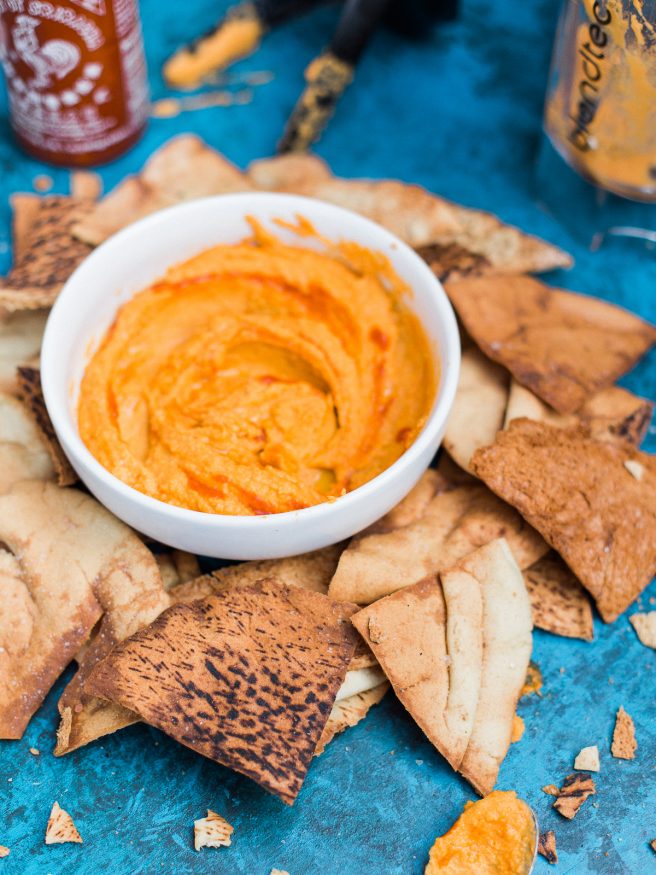 This sriracha hummus can be made in under 10 minutes, has bold flavor and nice heat that you'll want to put on everything!