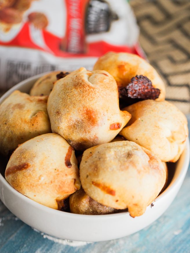 Meatball Marinara Bombs with pre-cooked Italian meatballs, pizza dough, mozzarella cheese and marinara sauce. Super fun snack idea, great for watch parties!