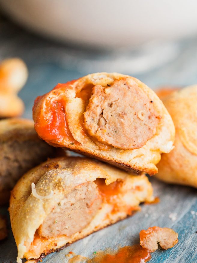 Meatball Marinara Bombs with pre-cooked Italian meatballs, pizza dough, mozzarella cheese and marinara sauce. Super fun snack idea, great for watch parties!